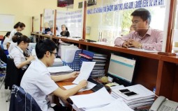 Người dân thực hiện thủ tục đất đai sau khi bỏ cấp huyện ở đâu?